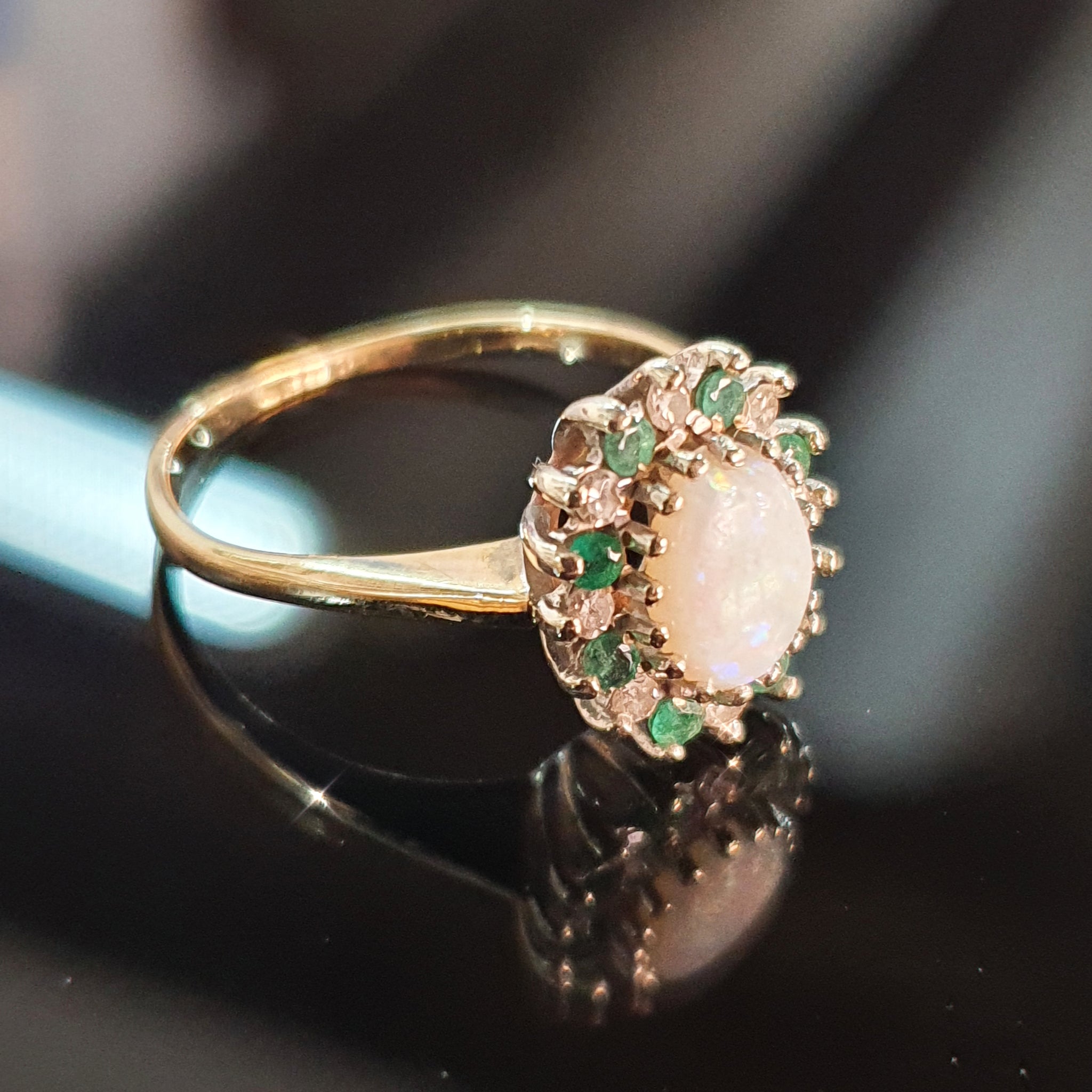 Opal, Diamond and Emerald Ring set on 9ct Yellow Gold