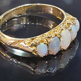 5 Stone Opal Ring set on 18ct Yellow Gold